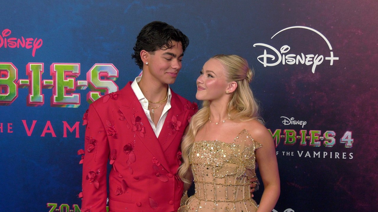 Malachi Barton and Freya Skye "Zombies 4: Dawn of the Vampires" Premiere Blue Carpet