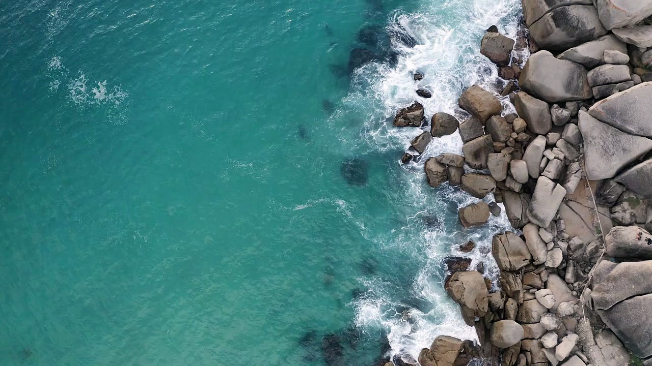waves crashing against rocks