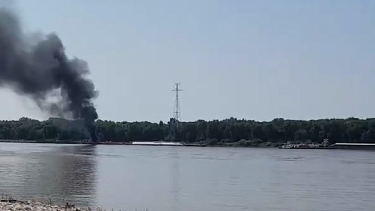 Horrified onlooker films after helicopter hits power lines and crashes into Mississippi river, killing two