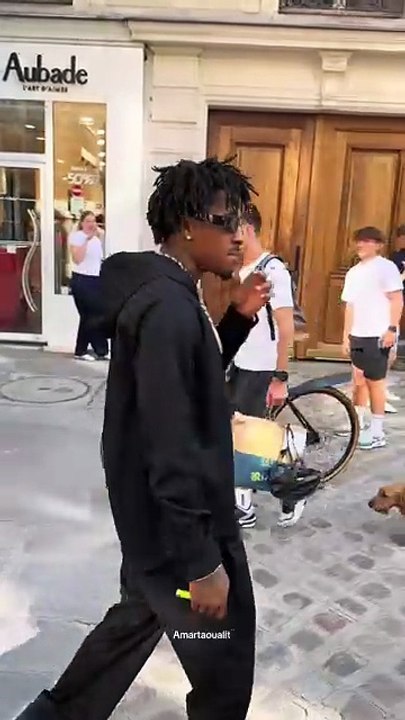 Rapper NBA Youngboy strolls through Paris