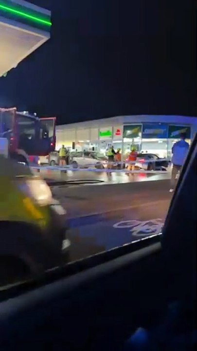 Scene after car crashes into BP garage